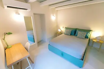 Letto o letti in una camera di Veronique by Dimore in Sicily