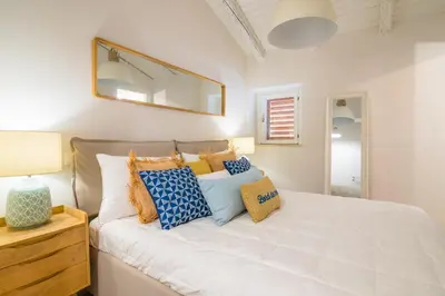 Letto o letti in una camera di Veronique by Dimore in Sicily