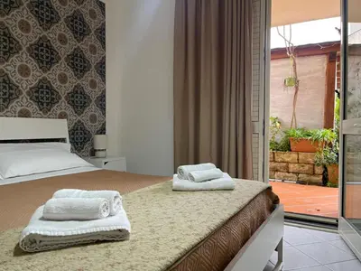 Letto o letti in una camera di Casa la conchiglia sulla spiaggia