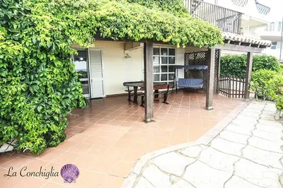 Balcone o terrazza di Casa la conchiglia sulla spiaggia