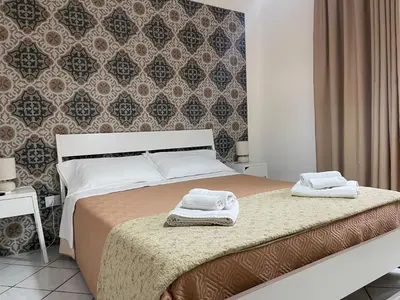 Letto o letti in una camera di Casa la conchiglia sulla spiaggia