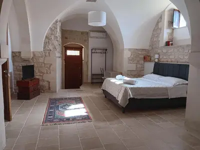 Letto o letti in una camera di Casa Sipione Papa