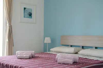 Letto o letti in una camera di Villa Chiara