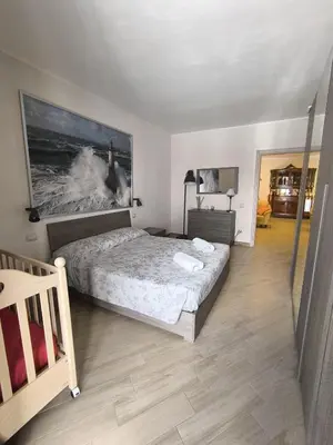 Letto o letti in una camera di Augusta Isola Appartamento in Pieno Centro