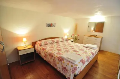 Letto o letti in una camera di Case Vacanze Agrumi