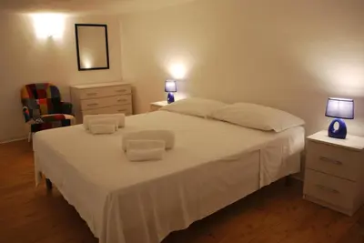 Letto o letti in una camera di Case Vacanze Agrumi