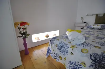 Letto o letti in una camera di Case Vacanze Agrumi