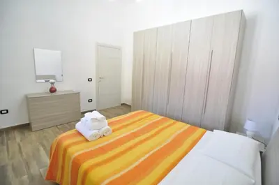 Letto o letti in una camera di Case Vacanze Agrumi