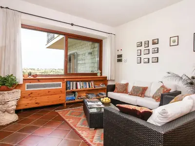 Area soggiorno di Villa al Castello by Interhome