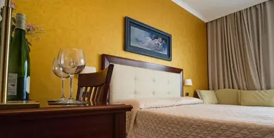Letto o letti in una camera di Hotel Flora
