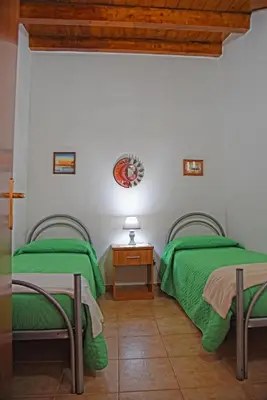 Letto o letti in una camera di Casa Celeste