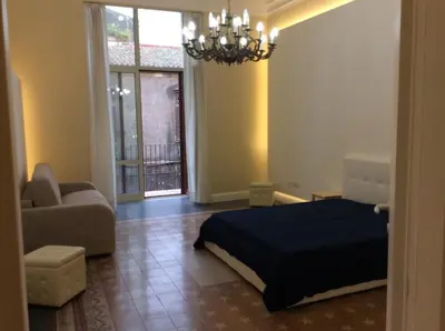 Letto o letti in una camera di Suite con terrazza in centro storico