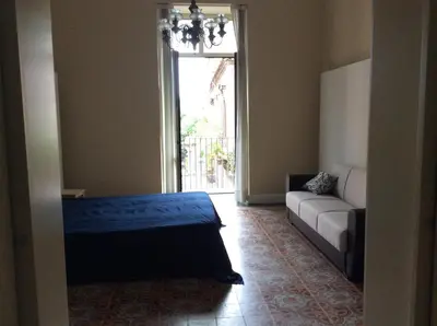 Letto o letti in una camera di Suite con terrazza in centro storico