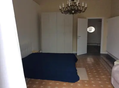 Letto o letti in una camera di Suite con terrazza in centro storico