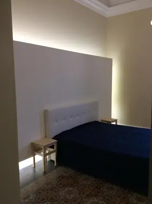 Letto o letti in una camera di Suite con terrazza in centro storico