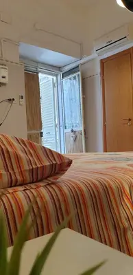Letto o letti in una camera di Giovanni s little house