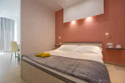 Letto o letti in una camera di San Giorgio Palace Hotel Ragusa Ibla