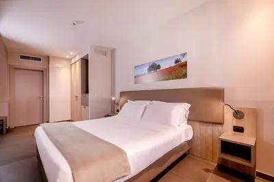 Letto o letti in una camera di San Giorgio Palace Hotel Ragusa Ibla