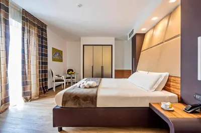 Letto o letti in una camera di San Giorgio Palace Hotel Ragusa Ibla