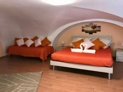 Letto o letti in una camera di Casa Kitea