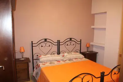 Letto o letti in una camera di ElySir Aurora