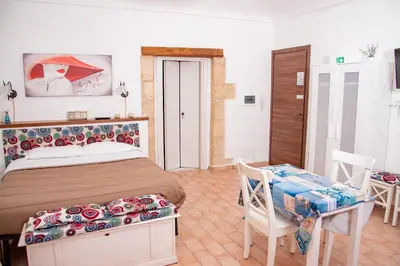 Letto o letti in una camera di Xenia - Il Vicoletto delle Dee