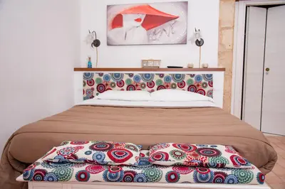 Letto o letti in una camera di Xenia - Il Vicoletto delle Dee