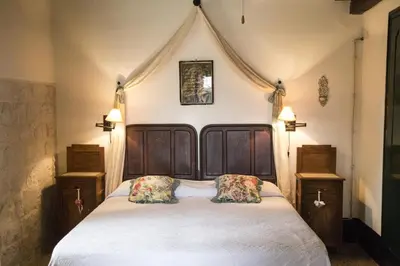 Letto o letti in una camera di Masseria Cianciò