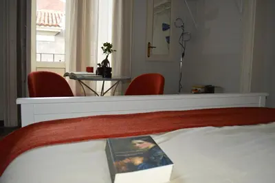 Letto o letti in una camera di Bed, Book & Breakfast Landolina