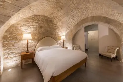 Letto o letti in una camera di Baroni Giampiccolo Suite