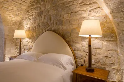 Letto o letti in una camera di Baroni Giampiccolo Suite