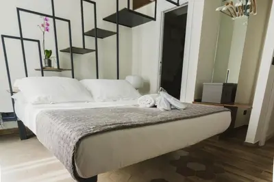 Letto o letti in una camera di Catania House