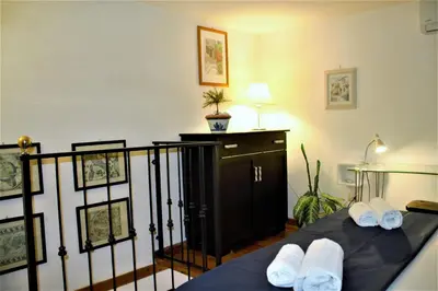 Letto o letti in una camera di Home Isola di Luce