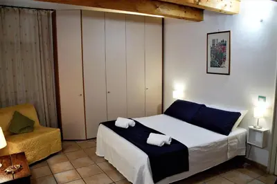 Letto o letti in una camera di Home Isola di Luce