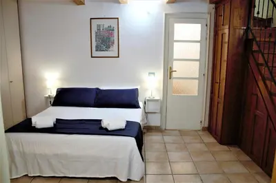 Letto o letti in una camera di Home Isola di Luce