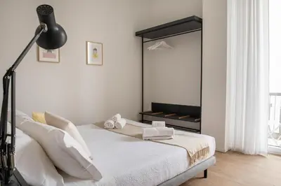Letto o letti in una camera di Casa Qosi B&B