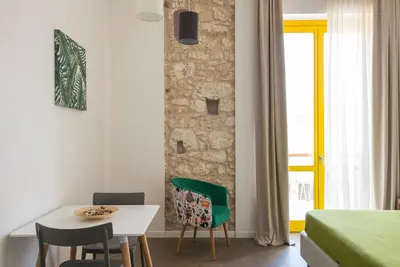 Letto o letti in una camera di Archinuè