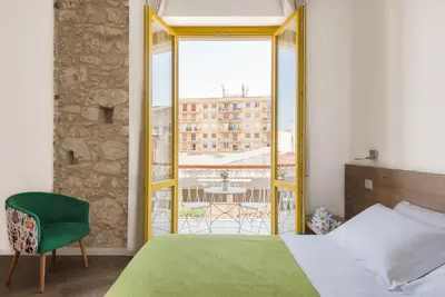 Letto o letti in una camera di Archinuè