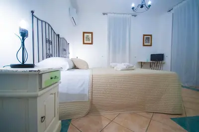 Letto o letti in una camera di Albergo La Fontanella