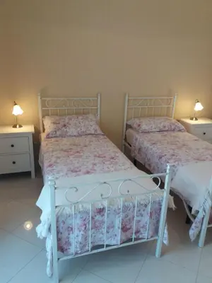 Letto o letti in una camera di adalgisa house