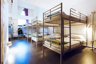 Letto o letti in una camera di LoL Hostel Siracusa