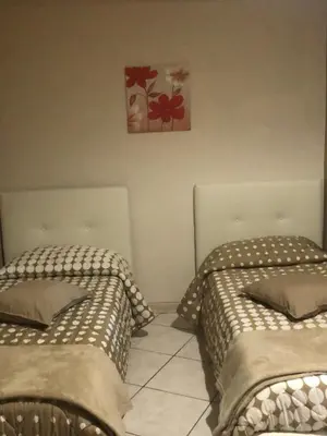 Letto o letti in una camera di La finestra sul Castello