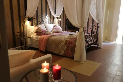 Letto o letti in una camera di Aitna B&B