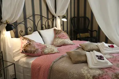 Letto o letti in una camera di Aitna B&B