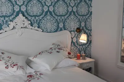Letto o letti in una camera di Aitna B&B