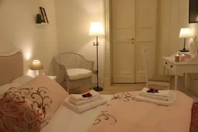 Letto o letti in una camera di Aitna B&B