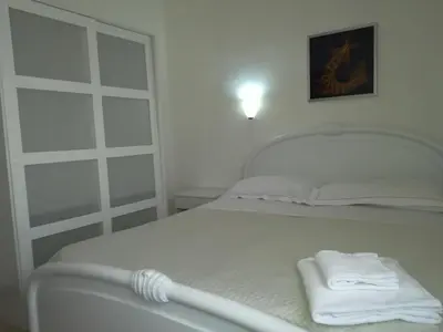 Letto o letti in una camera di Seaside village Catania