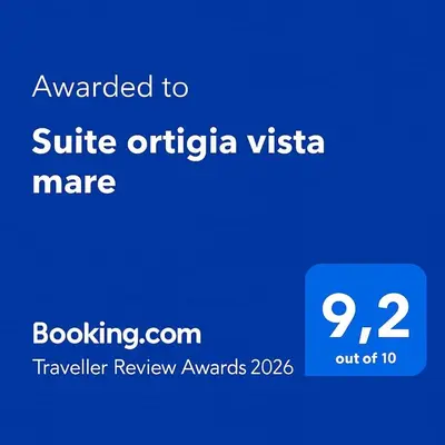 Certificato, attestato, insegna o altro documento esposto da Suite ortigia vista mare