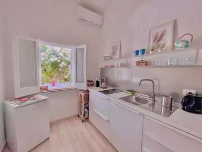 Cucina o angolo cottura di At the Seacily