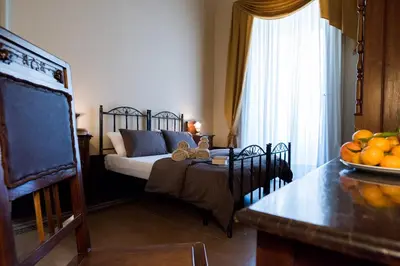 Letto o letti in una camera di Lettera Living